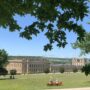 Image of Chatswort House taken from the gardens in summer time