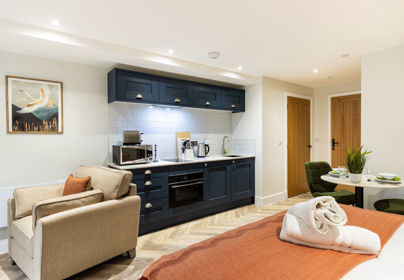 Image showing the kitchen and dining area for 2 people inside Studio Apartment 18 at Rock Mill