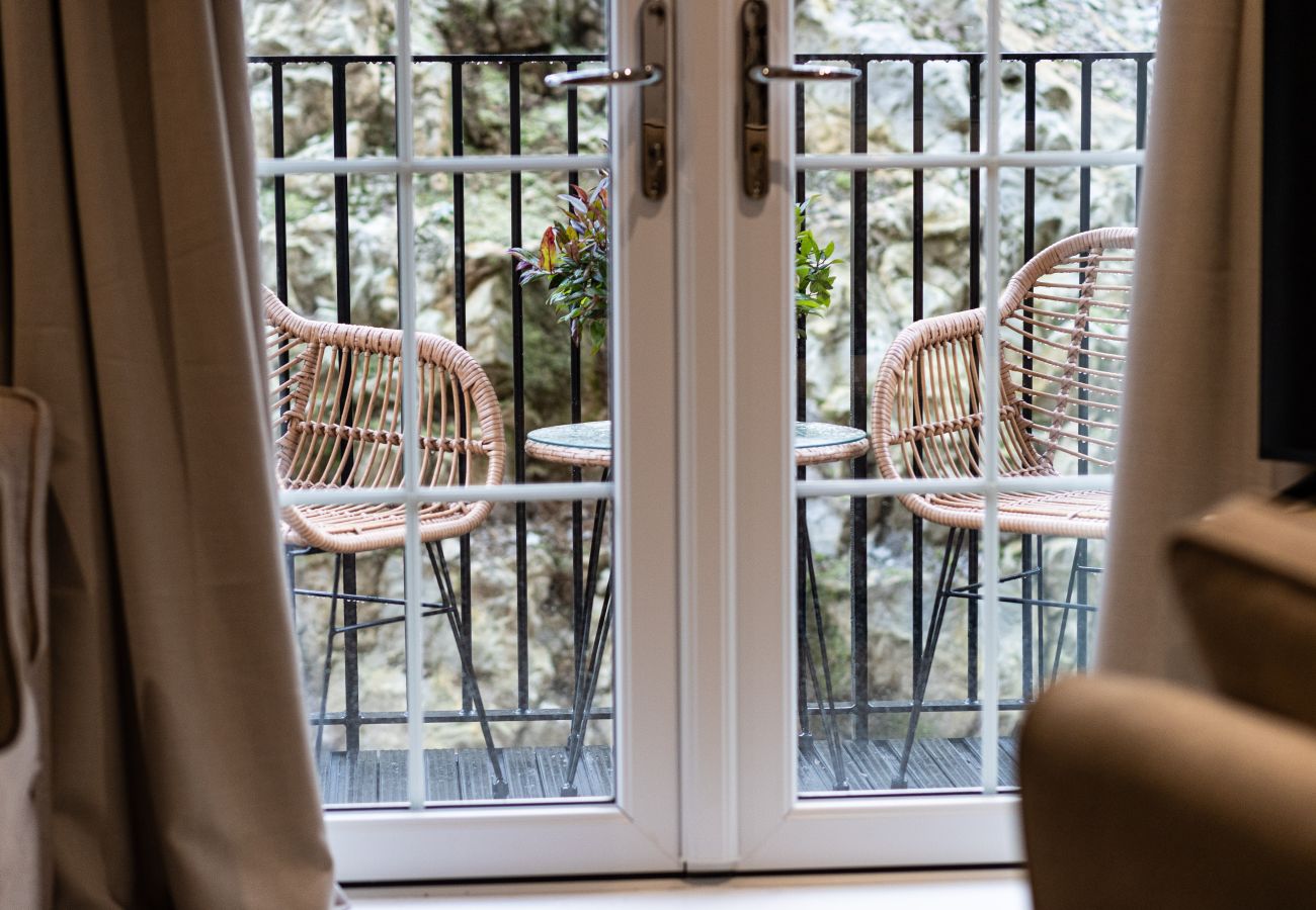 Image showing French doors open to small balcony at Rock Mill Studio Apartment 18