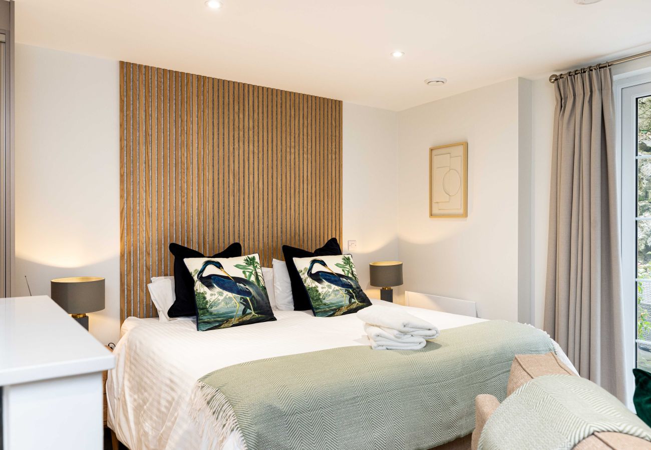 Image showing the bed inside studio apartment 9 at Rock Mill sleeping 2 people