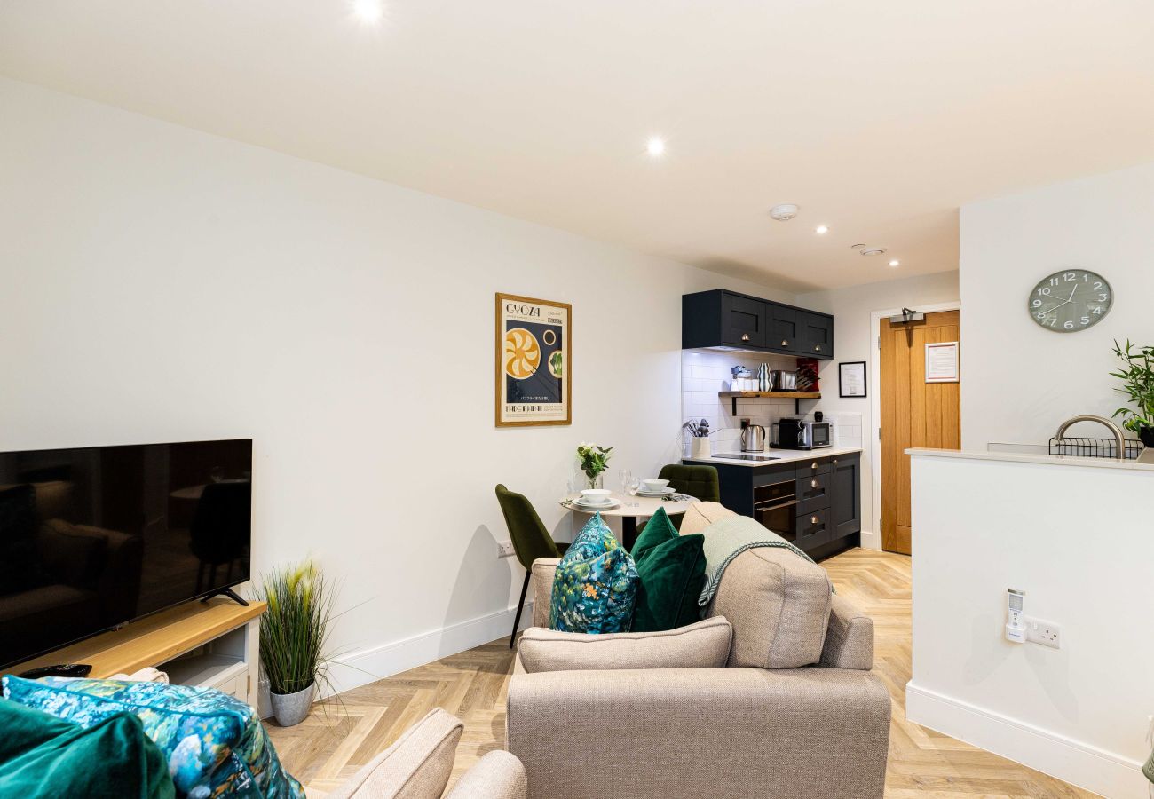 Image showing the combined living, dining and kitchen area inside Studio Apartment 9 at Rock Mill