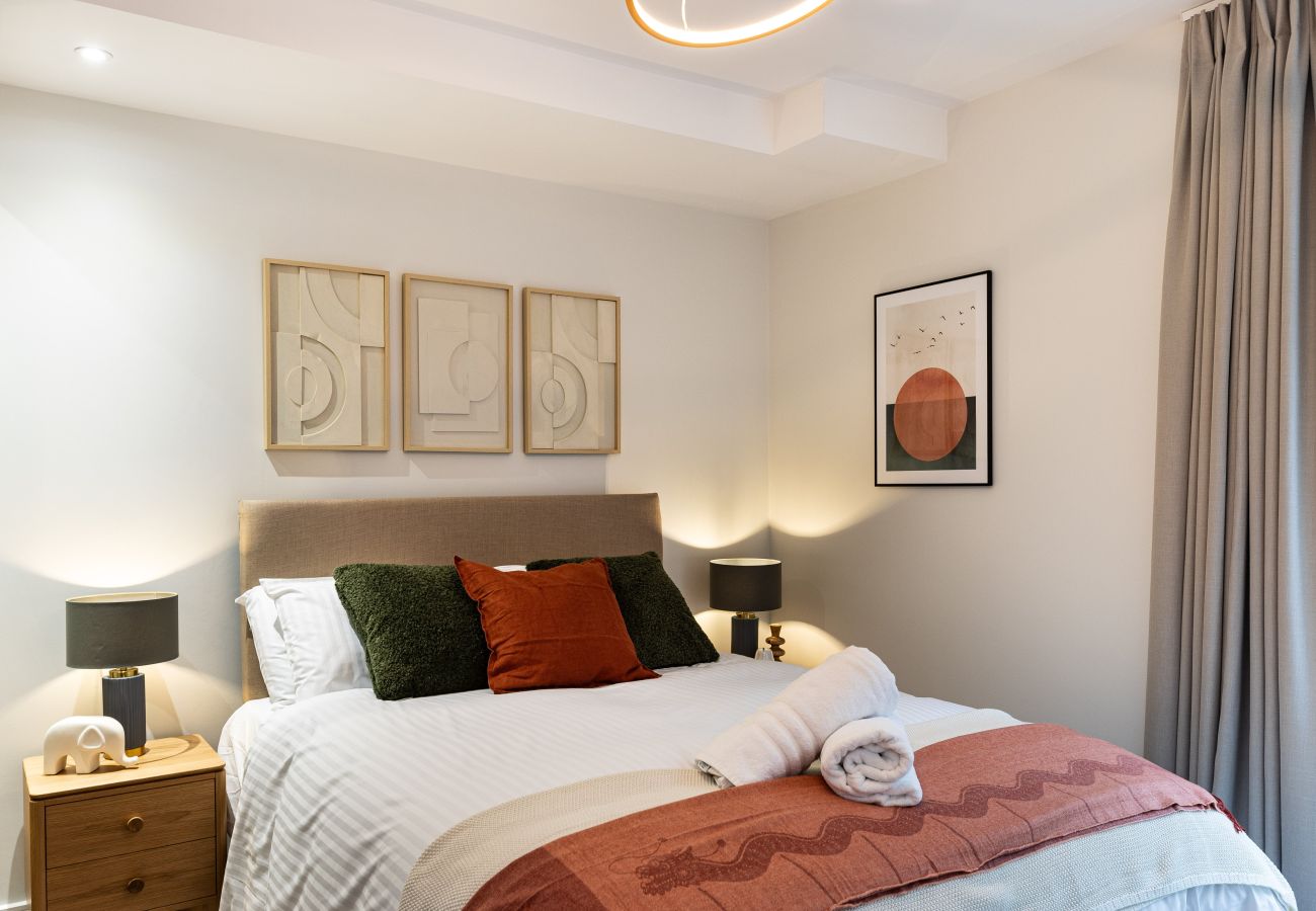 Image showing the fixed double bed inside Apartment 4 at Rock Mill Holiday Apartments