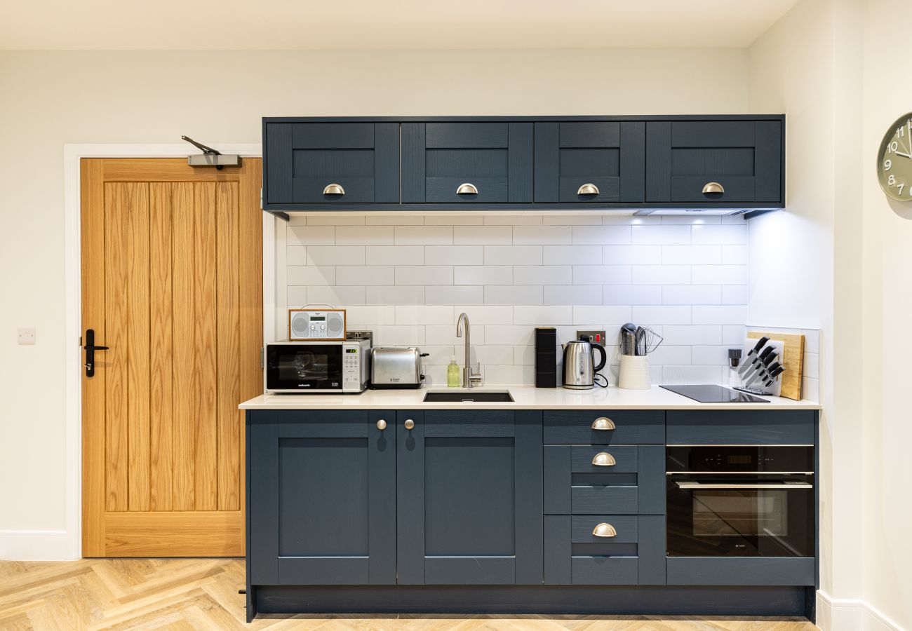 Image showing the fully equipped kitchen inside Rock Mill Apartment 4