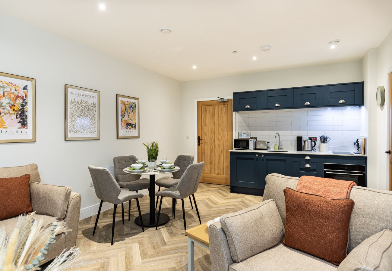 Image showing the combined kitchen and dining area of Rock Mill Apartment 4