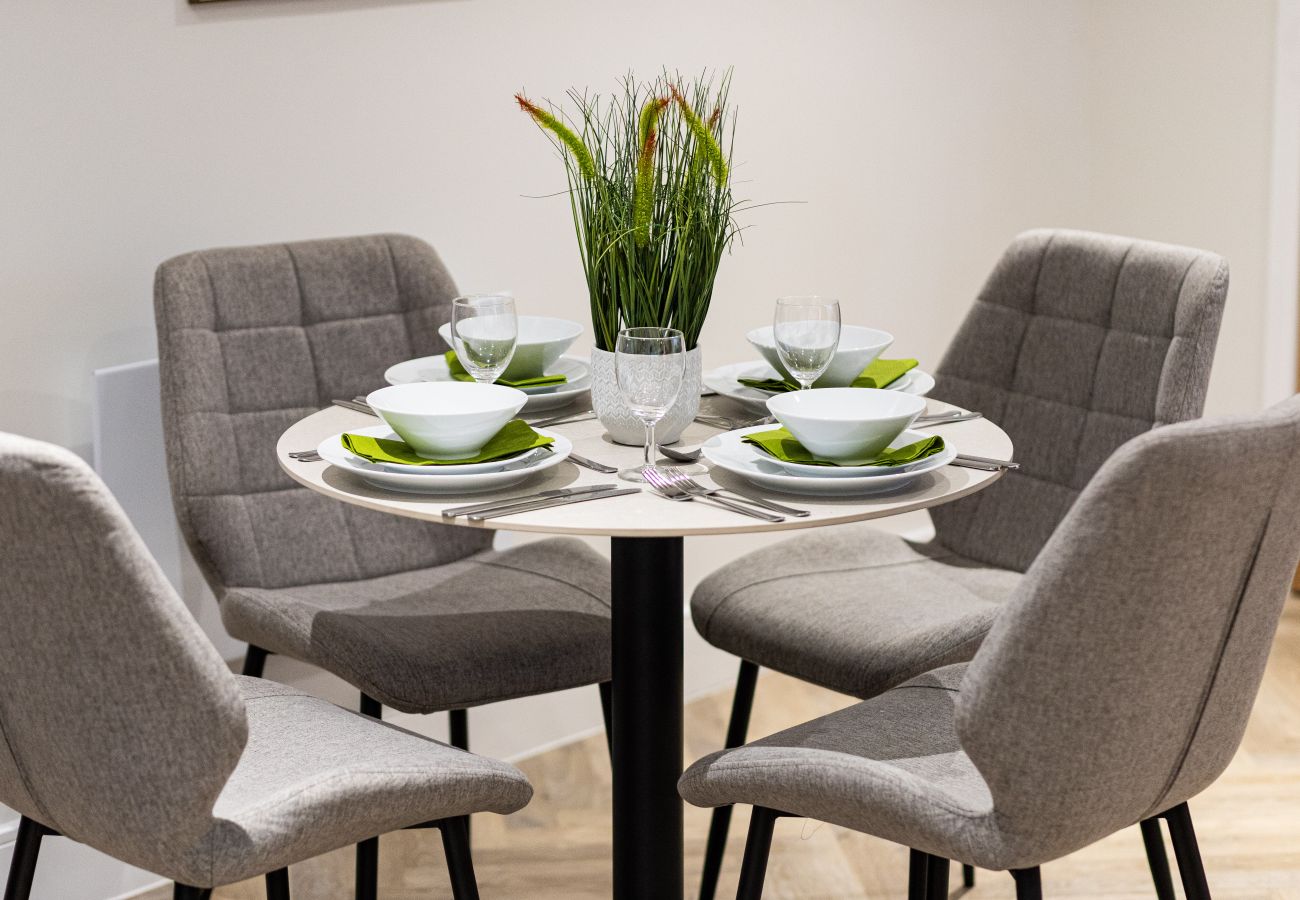 Image showing dining for up to 4 guests inside Rock Mill Apartment 4