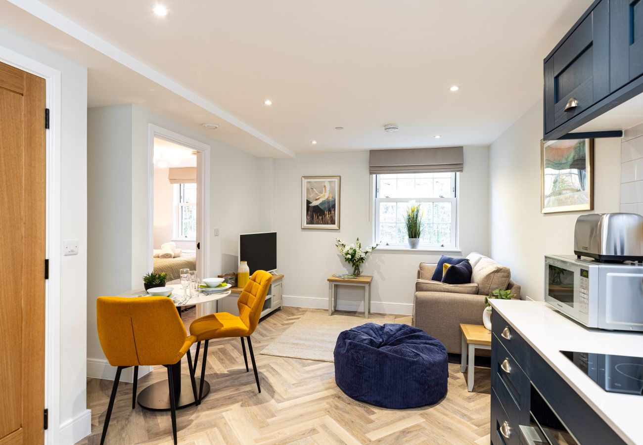 Image showing the living and dining areas for Rock Mill Apartment 19 in Stoney Middleton