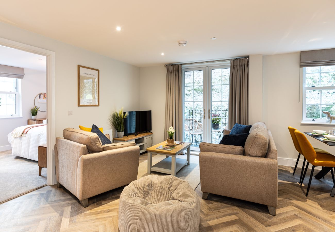 Image showing the living area inside Rock Mill Apartment 22 with smart TV