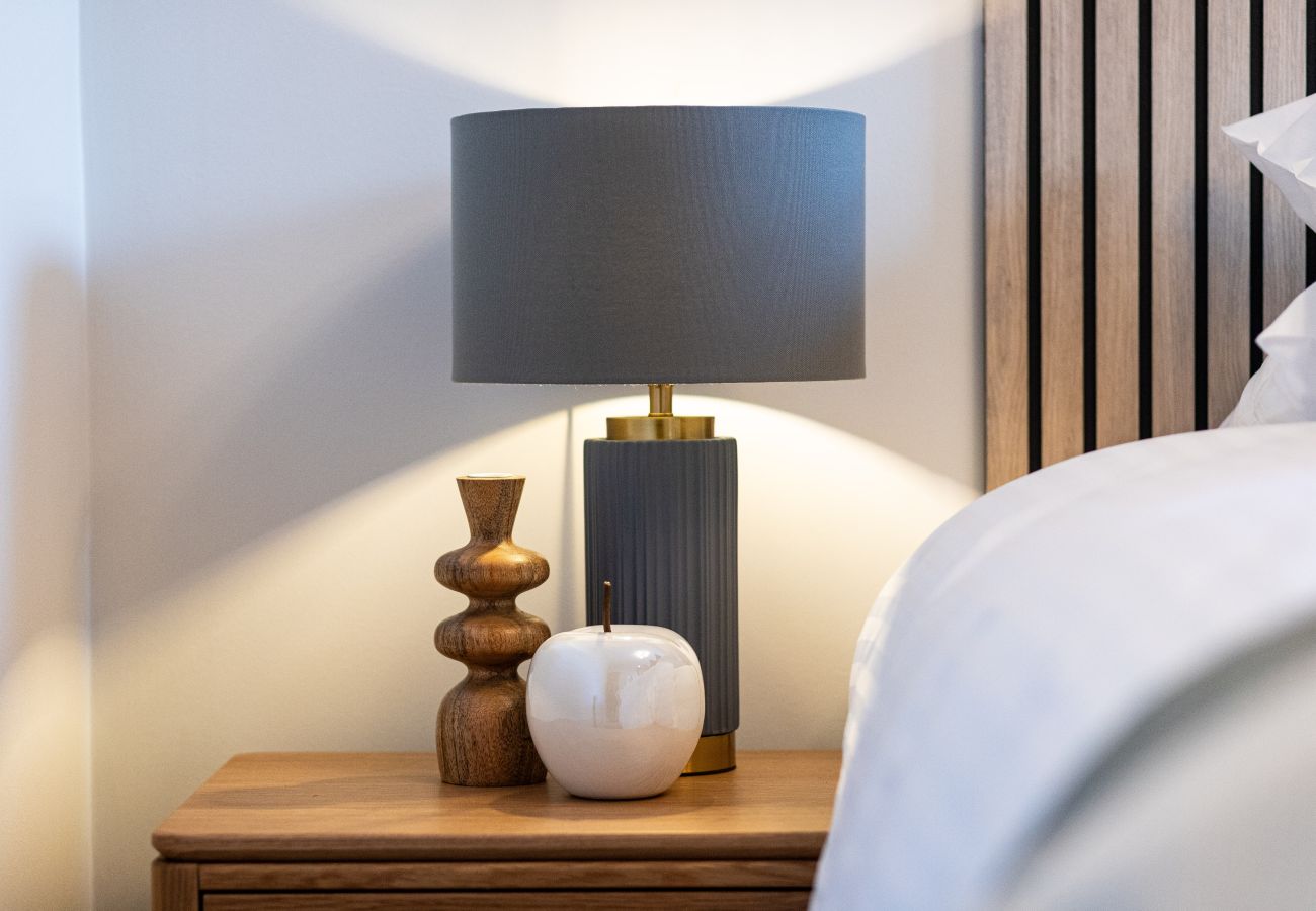 Image showing the warm bedroom lighting inside Rock Mill luxury apartment 22