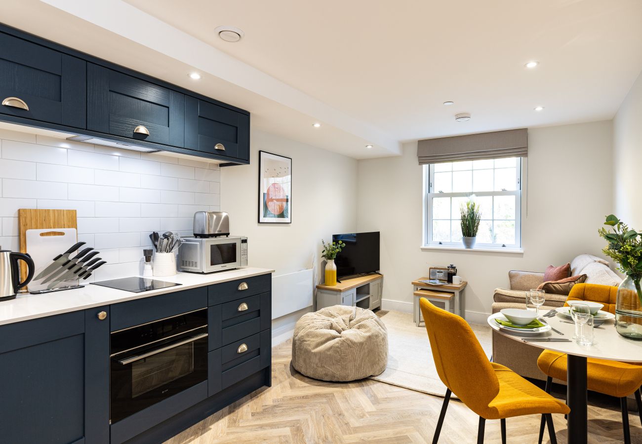 Image showing the combined kitchen, dining and living areas inside Apartment 21