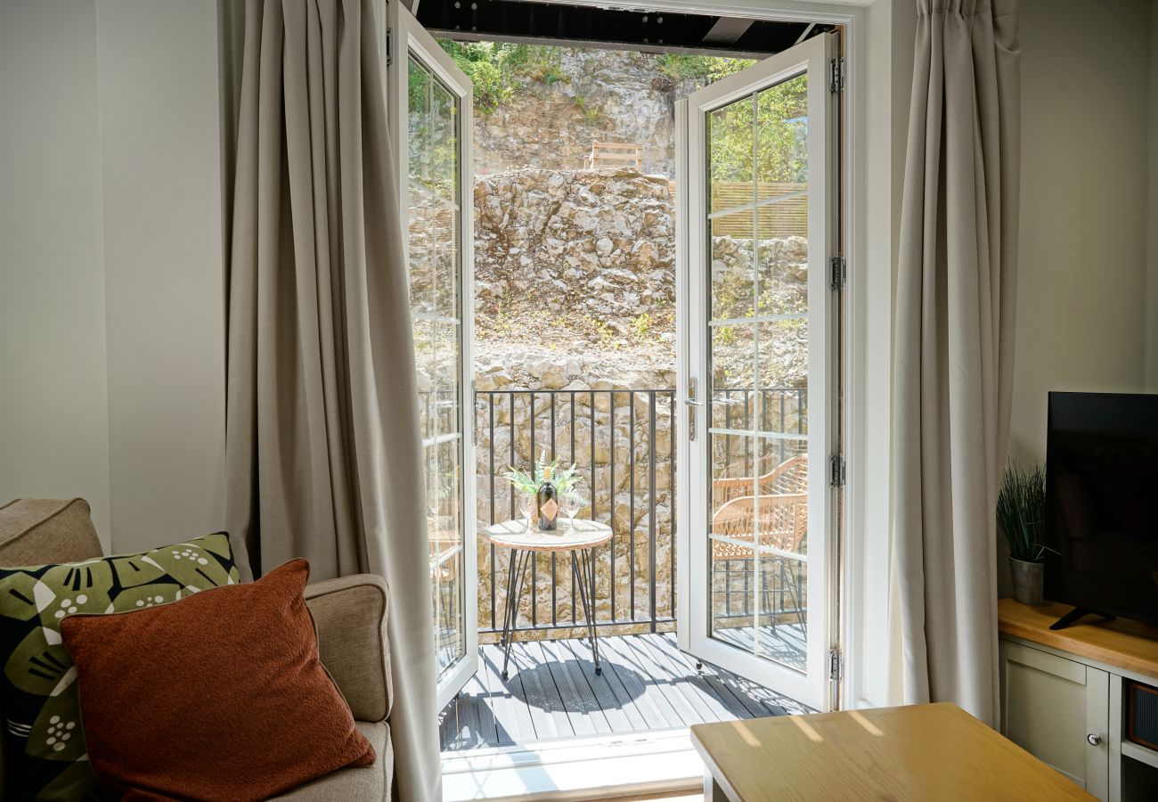Image showing Rock Mill apartment 12 French doors leading to balcony with seating