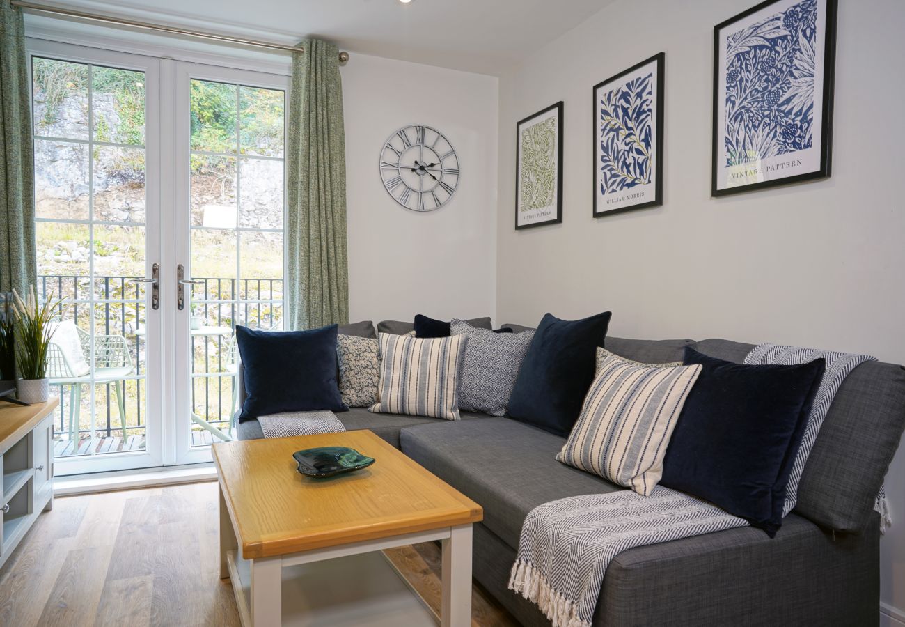 Image of the comfy seating in the living area of rock mill apartment 27