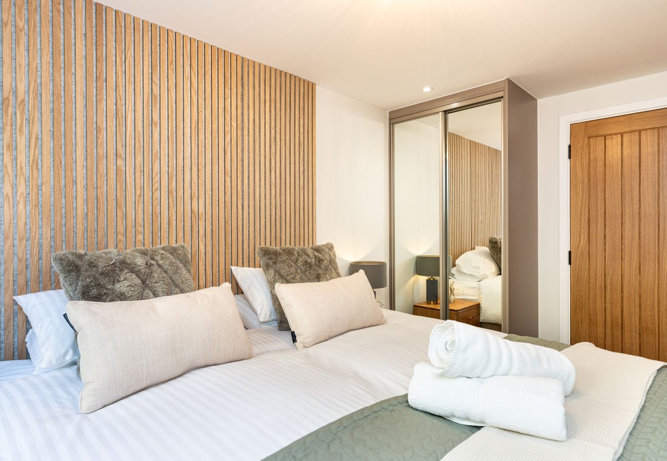 Image showing the bedroom with soft furnishings inside Apartment 15 at Rock mill