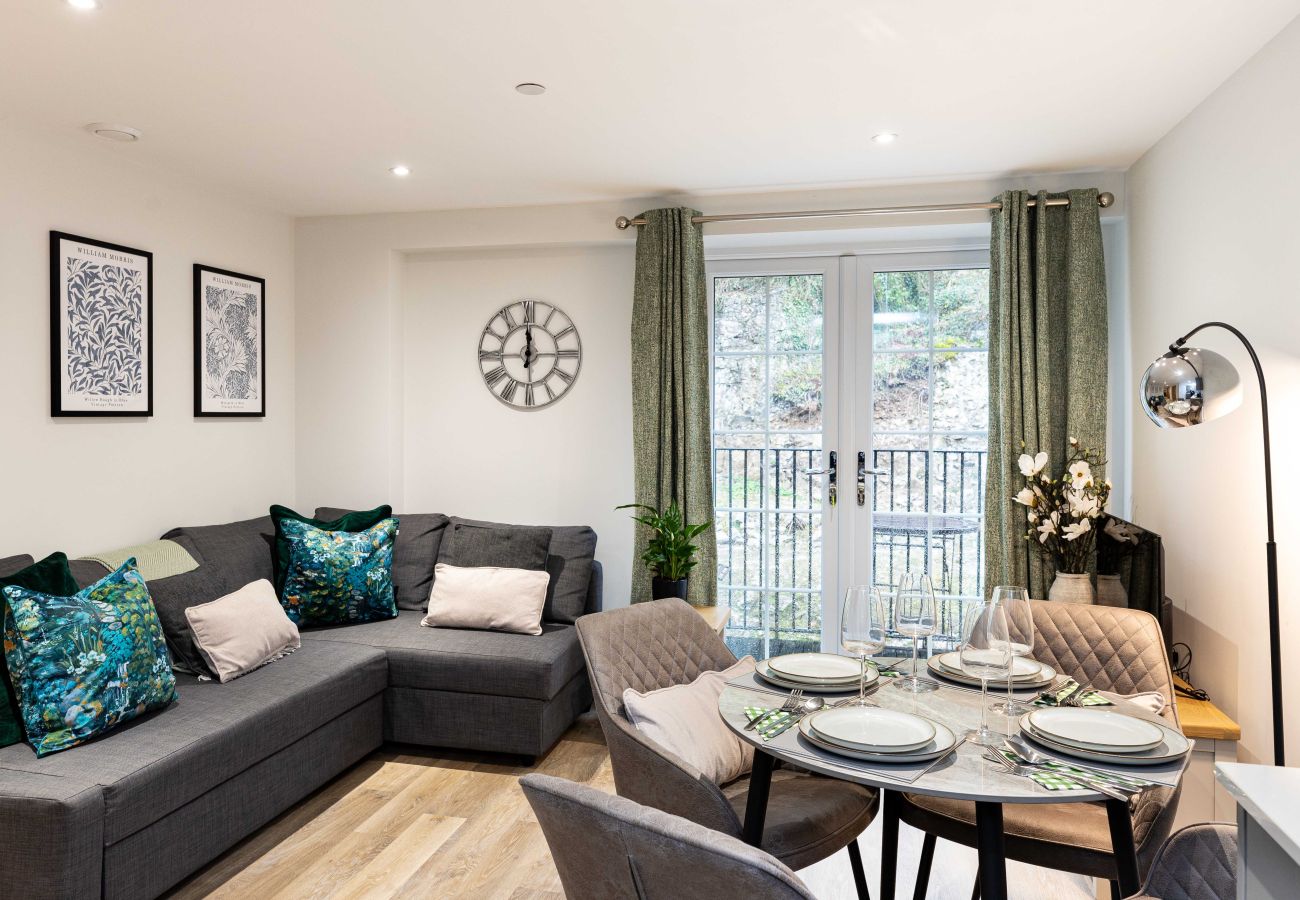 Image of the combined living and dining area inside Rock mill duplex apartment 42