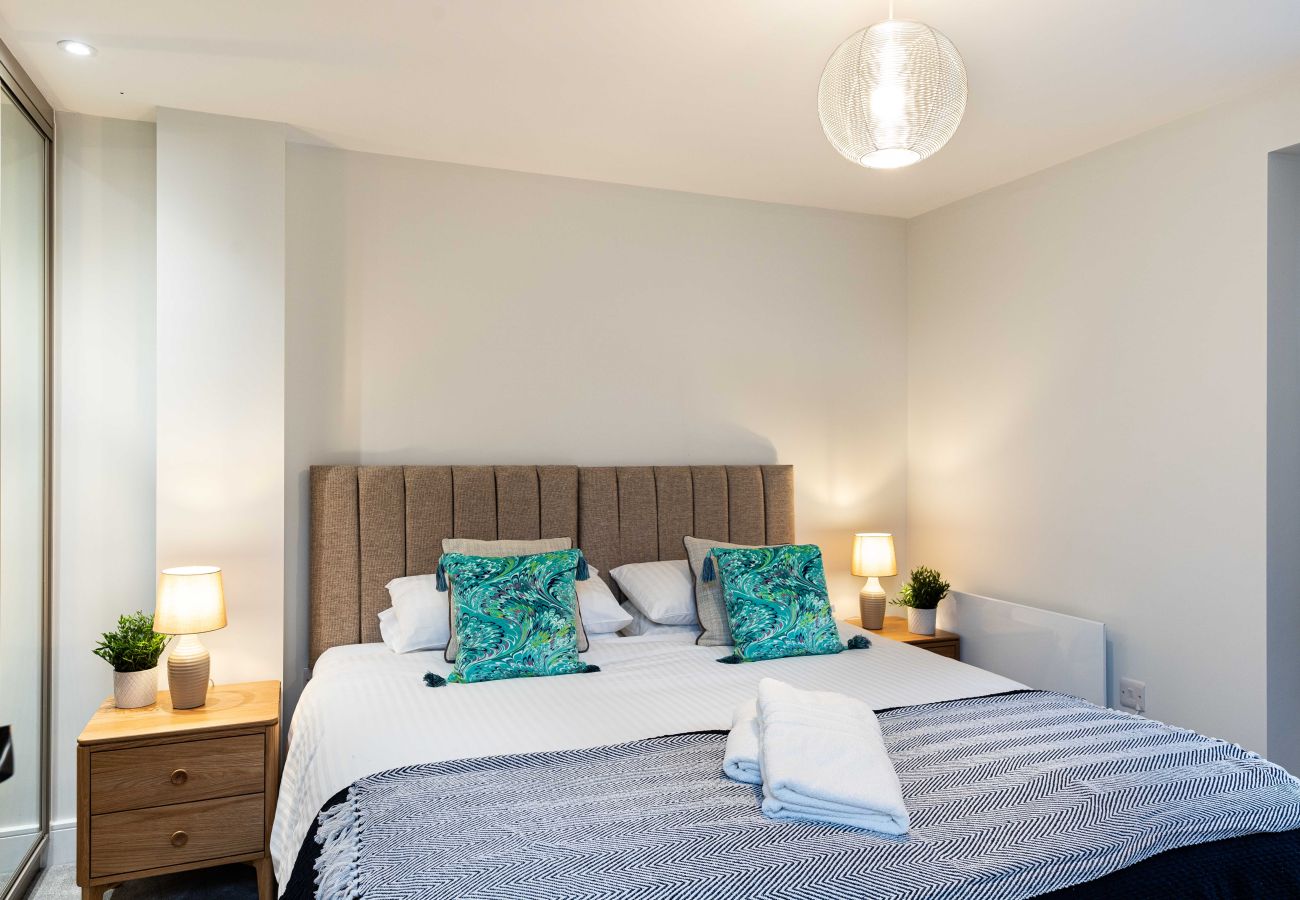 Image of the stylish bedroom inside rock mill luxury holiday apartment 37