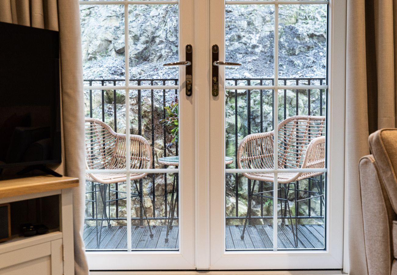 Image showing the outdoor balcony with seating for 2 guests in studio apartment 16 at Rock Mill