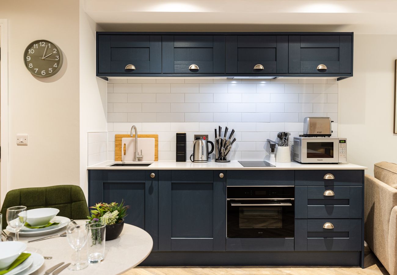 Image showing the fully equipped kitchen inside Rock Mill studio apartment 16