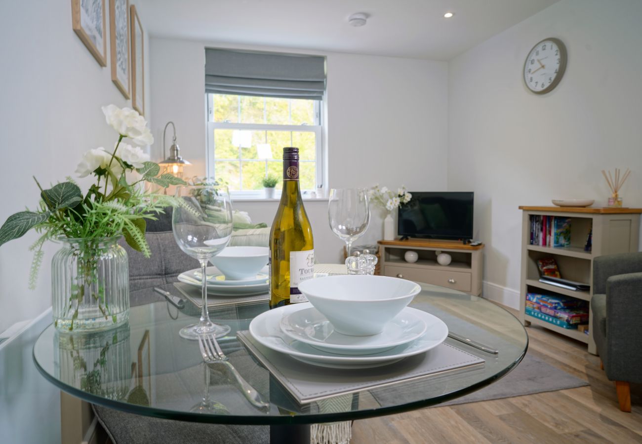 Image showing dining area for two guests at Rock Mill Apartment 36 in Stoney Middleton.