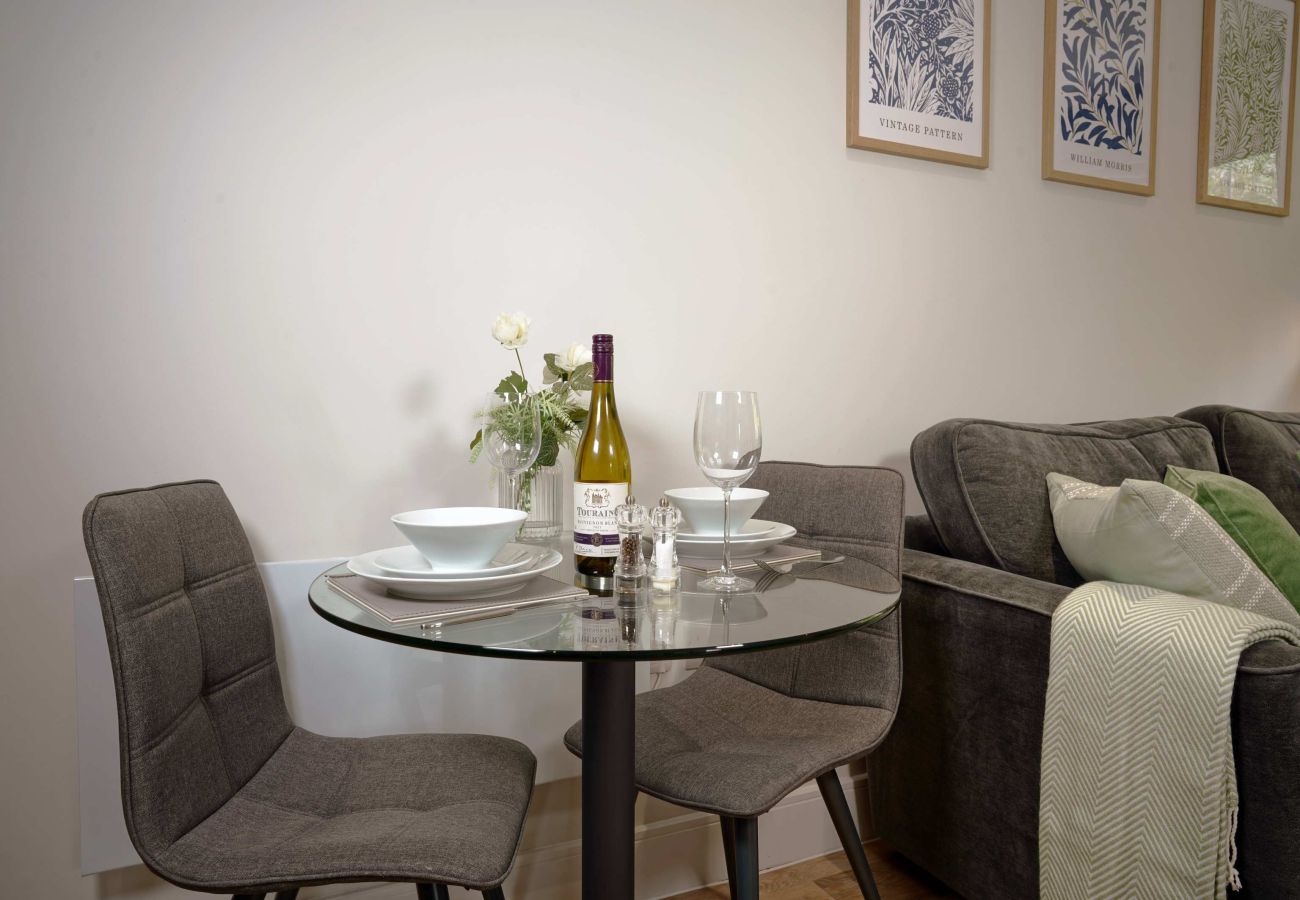 Image showing dining area for two guests at Rock Mill Apartment 36 in Stoney Middleton.